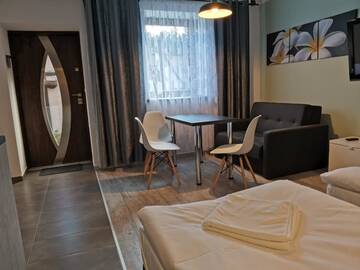 Фото номера Стандартный номер-студио Апартаменты Apartamenty Jaskinia Solna г. Руда-Слёнска 7
